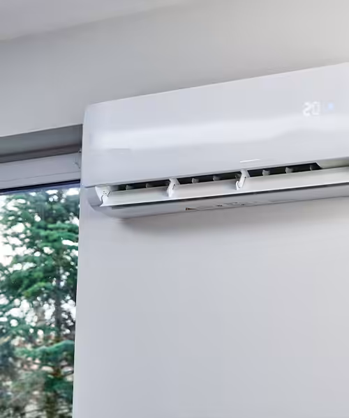 Ductless mini-split air conditioner indoor unit mounted on wall showing 20 degree temperature setting