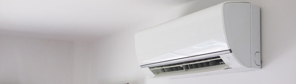 Wall-mounted air conditioning unit with open vent panel, relevant to air conditioning not turning on issues