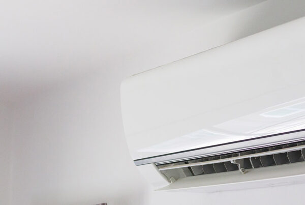 Wall-mounted air conditioning unit with open vent panel, relevant to air conditioning not turning on issues